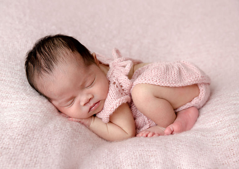 Newborn baby in pink - newborn photos
