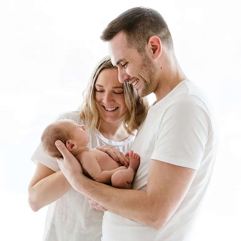 Wearing white for your newborn photoshoot.