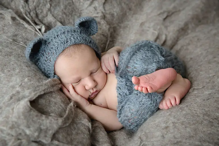 neutral background with blue colour pop - baby photoshoot newborn